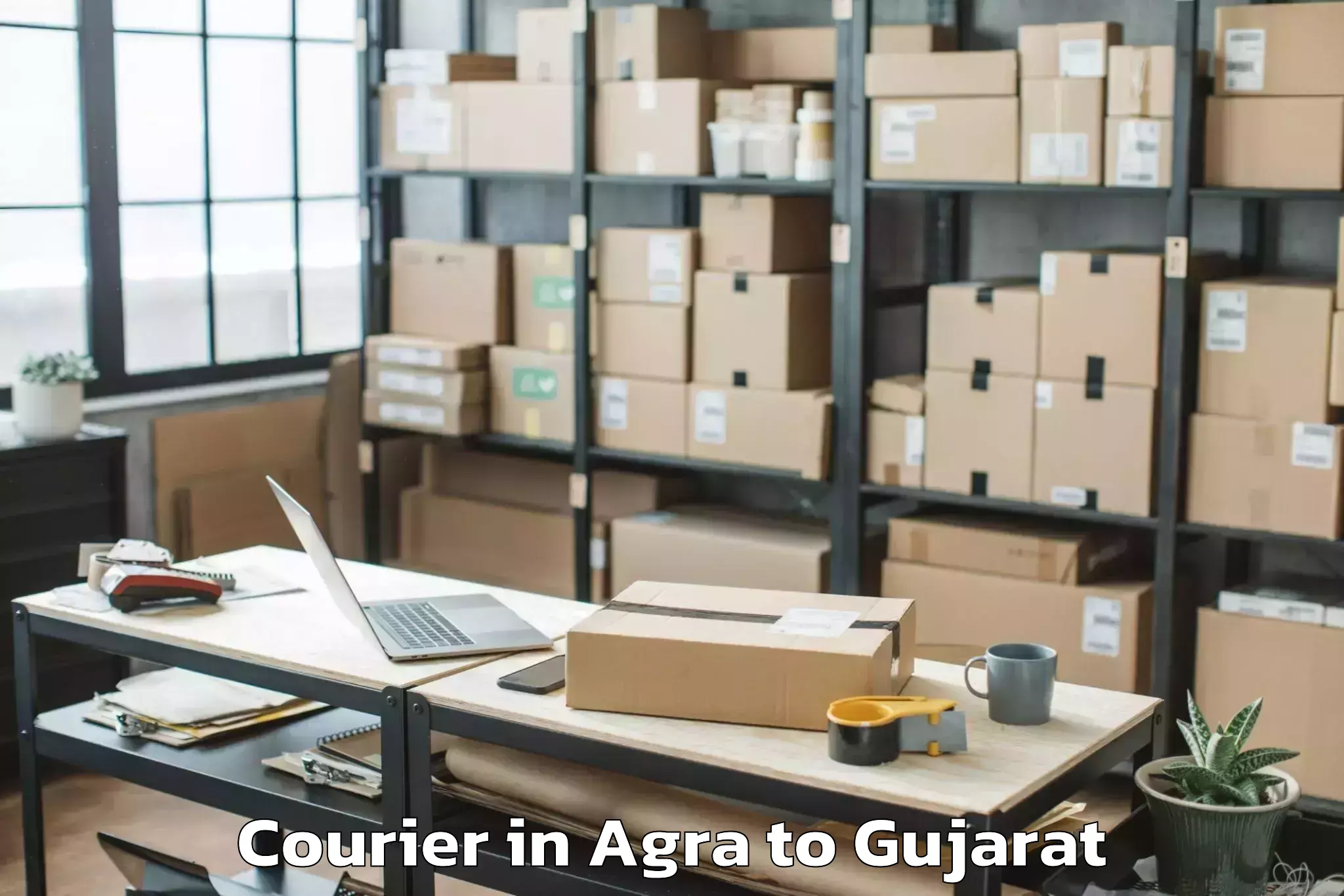 Book Agra to Dhuwaran Courier